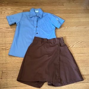 Girl Scout uniform. Includes polo and skirt